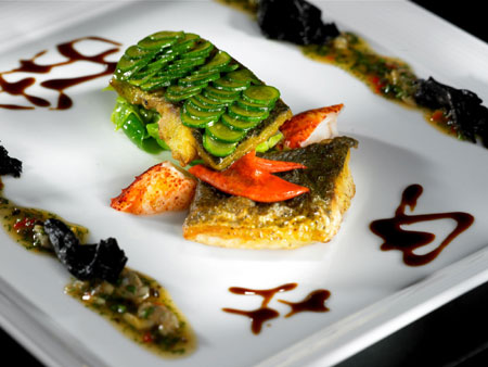 Pan fried Dorade Royale with steamed black mussels and roasted lobster