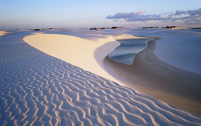 Dunes Near Beautiful Lagoon at Lencois Maranhenses Nacional Park, Brazi