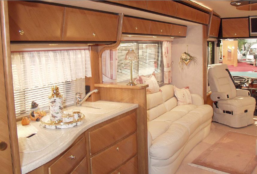    Land Yachts: Ultra Luxurious RVs with Parking Garage!