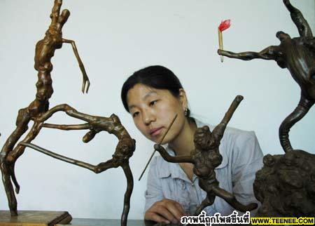 Tree-root carvings for Beijing Olympic Games