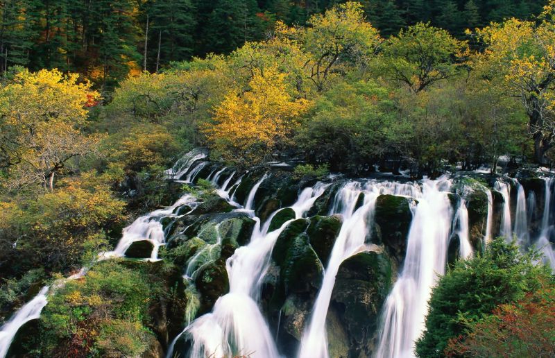 Waterfall Cascading In Nine Village Valley, Sichuan, China