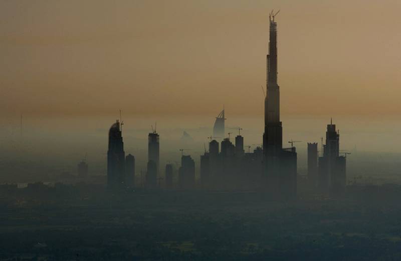 The Burj Dubai tower, under construction, will soon be the world\